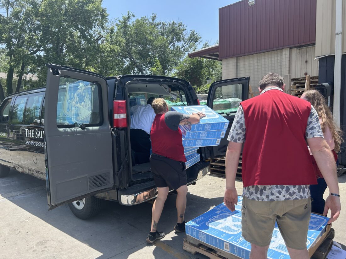 Customers at Lawrence hardware stores raise funds to purchase 105 fans for families in need